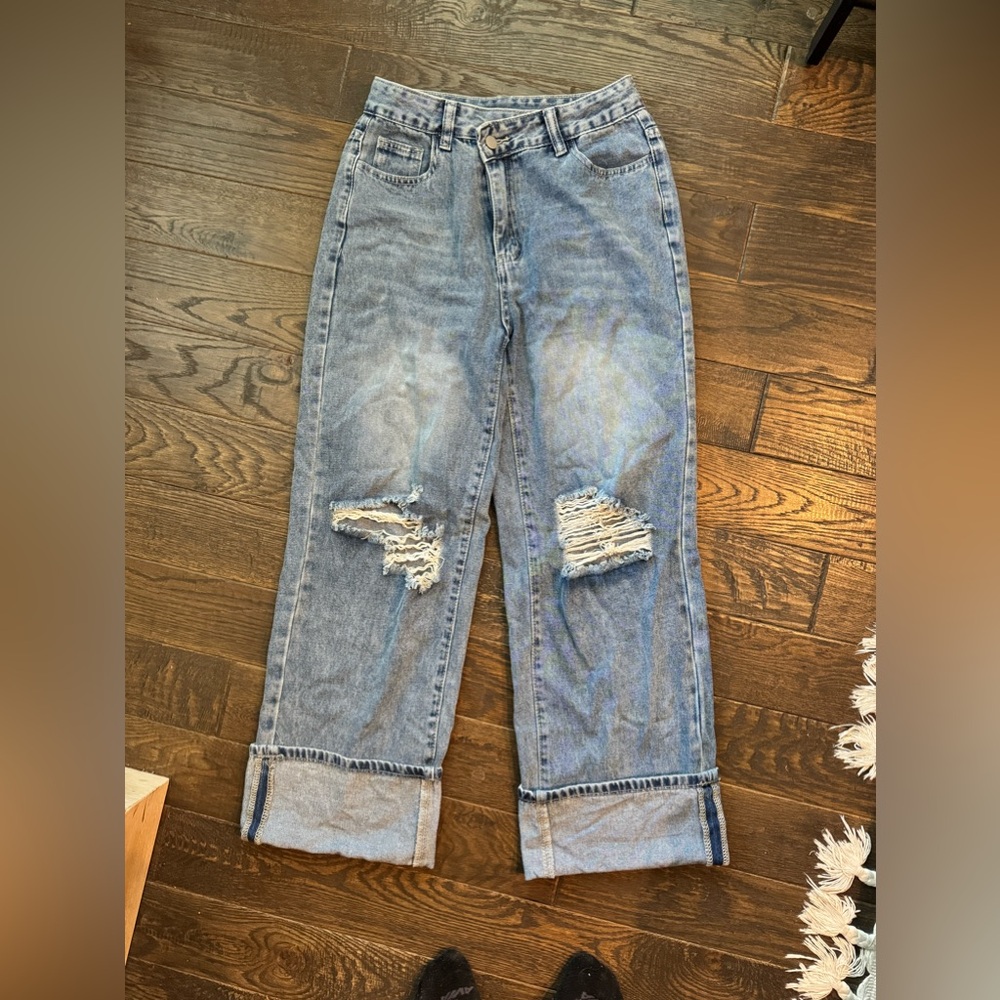 Wide straight leg cross over distressed jeans